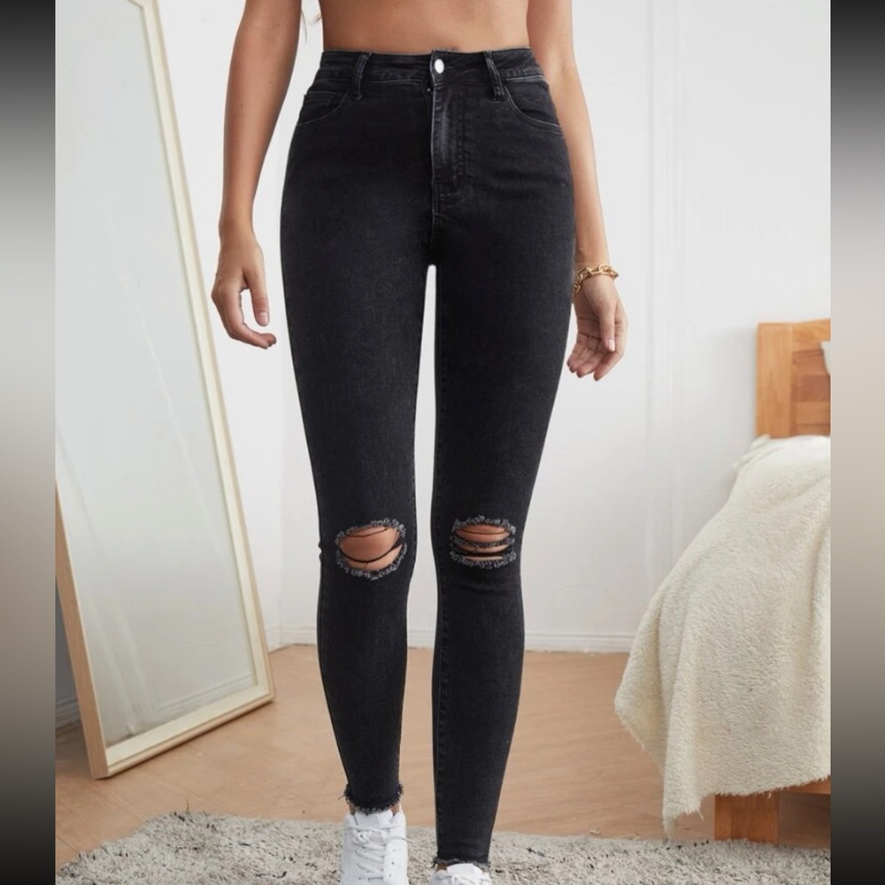 High waisted ripped raw hem skinny jeans